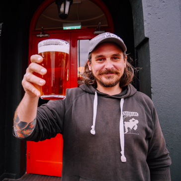 Head brewer Greg Hobbs with a pint of Five Points Best